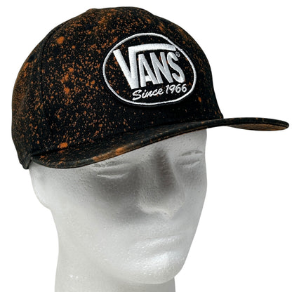 Vans black and orange speckled cap with front logo patch, adjustable fit and classic style