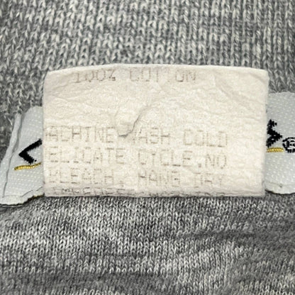 Caesars vintage T-shirt in gray, size large, showing care label details