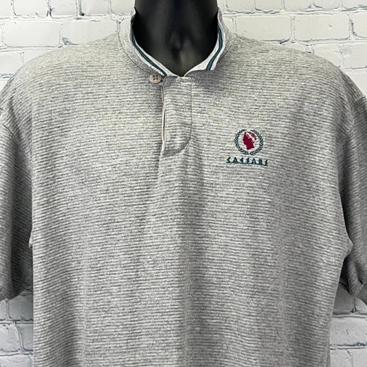 Caesars T-Shirt from the 2000s in gray with collar and logo, front view, featuring vegas caesars palace hotel