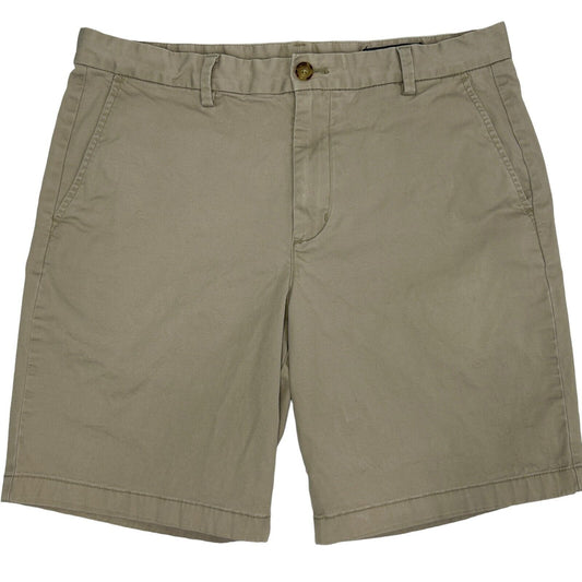 Vineyard Vines tan shorts in size medium with side pockets and button closure, front view