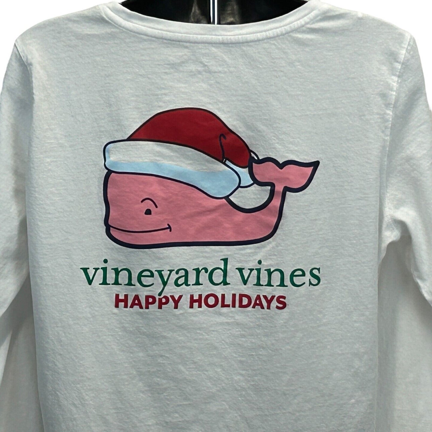 White Vineyard Vines T-Shirt displaying a festive whale graphic with a Santa hat and 'Happy Holidays' text