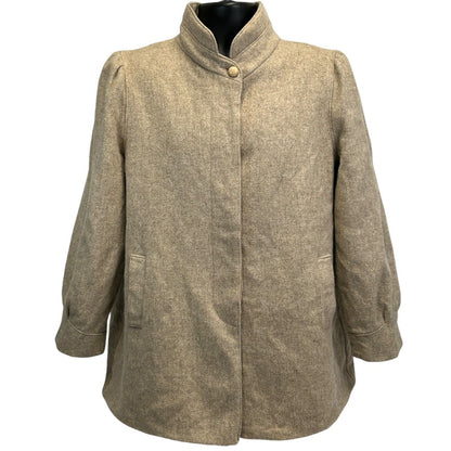 Front view of a beige Vintage 50s 60s wool coat with unique button closure and side pockets