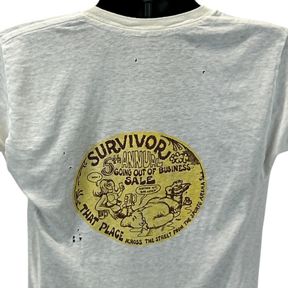 Vintage 60s 70s T-Shirt in cream color featuring a distressed graphic for a sale event on the back