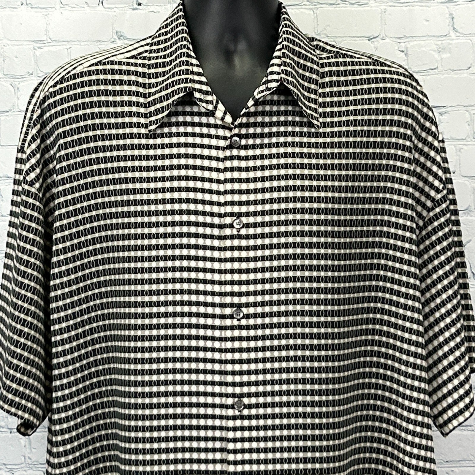 Monzini Vintage 70s Shirt in black and white checkered pattern, featuring a short sleeve and relaxed fit
