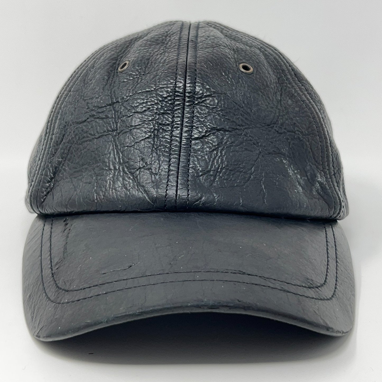 Front view of Vintage Baseball Hat in black leather by Wilsons Leather with textured finish