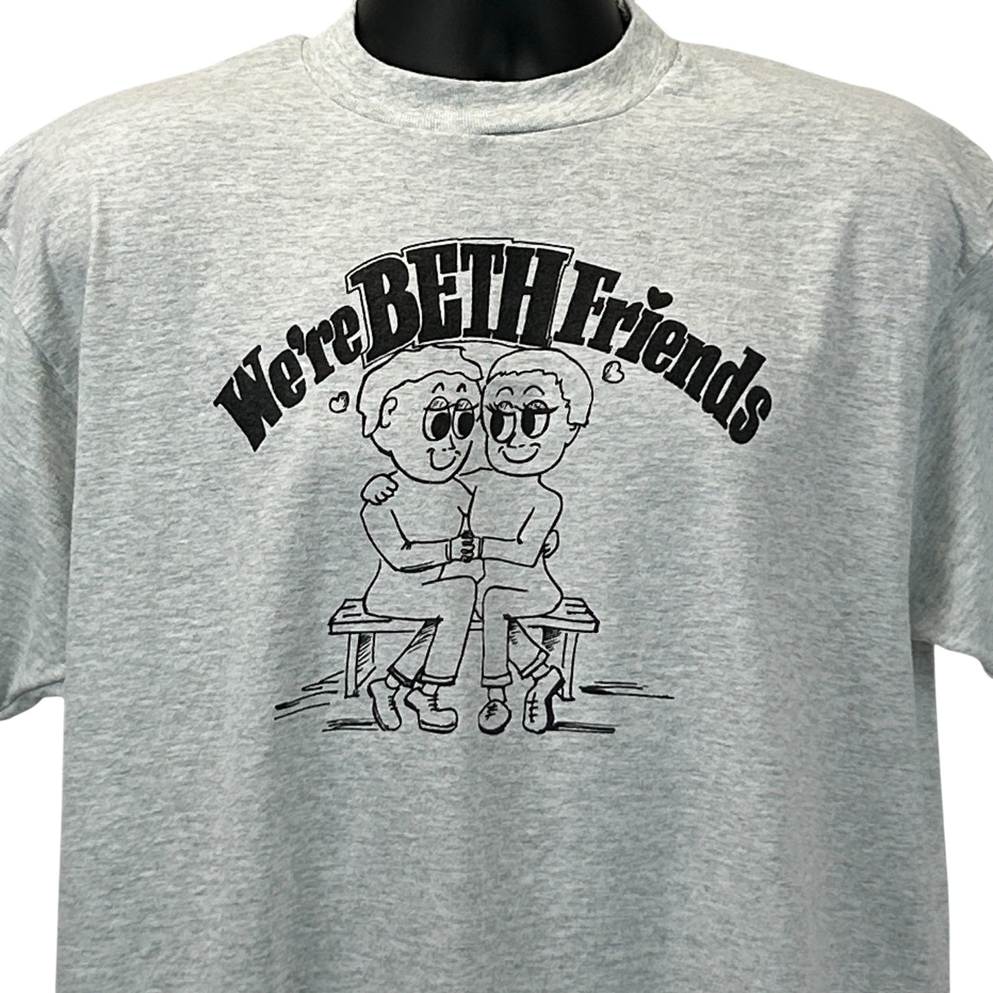 Gray Screen Stars T-Shirt featuring a playful graphic saying We're BETH Friends on the front