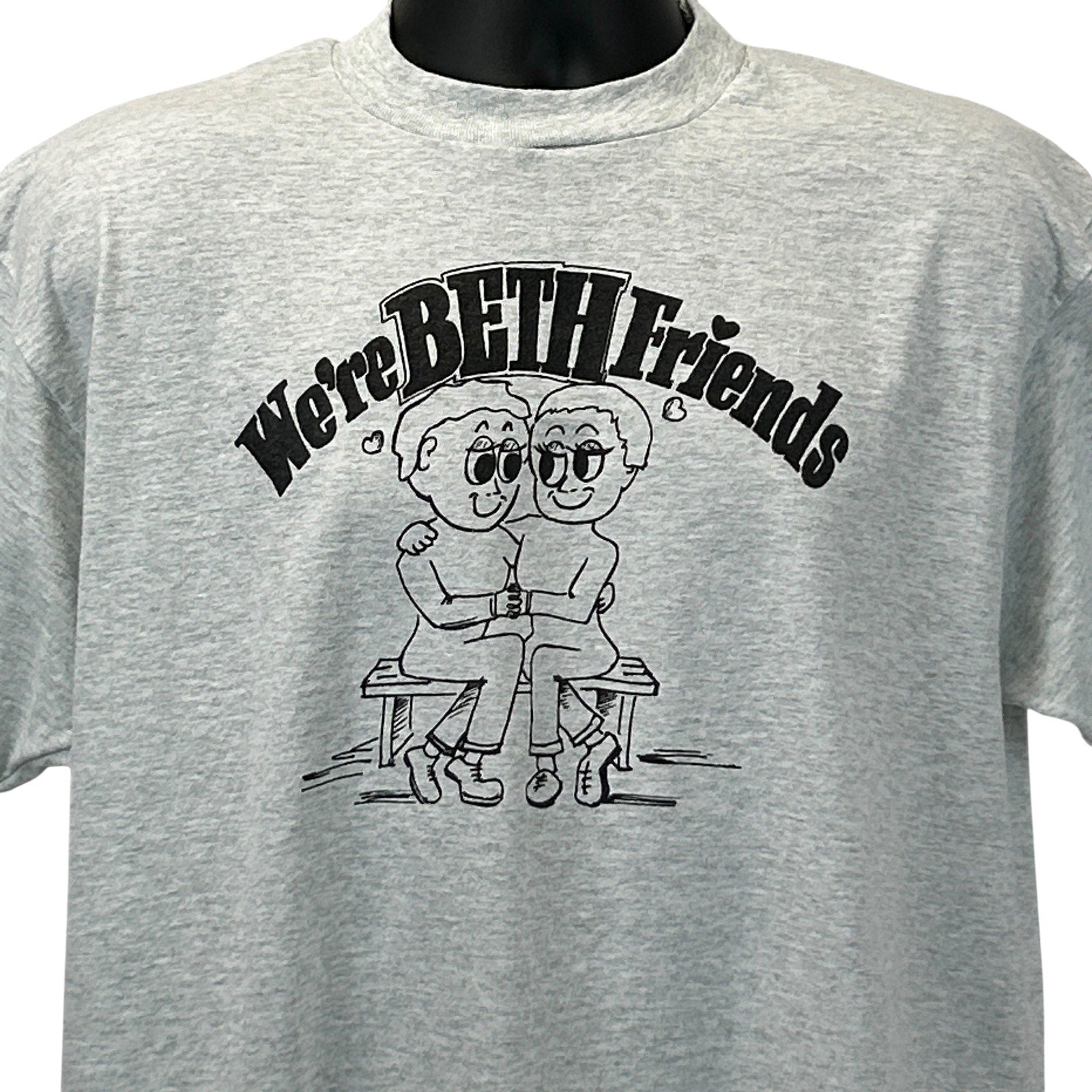 Gray Screen Stars T-Shirt featuring a playful graphic saying We're BETH Friends on the front