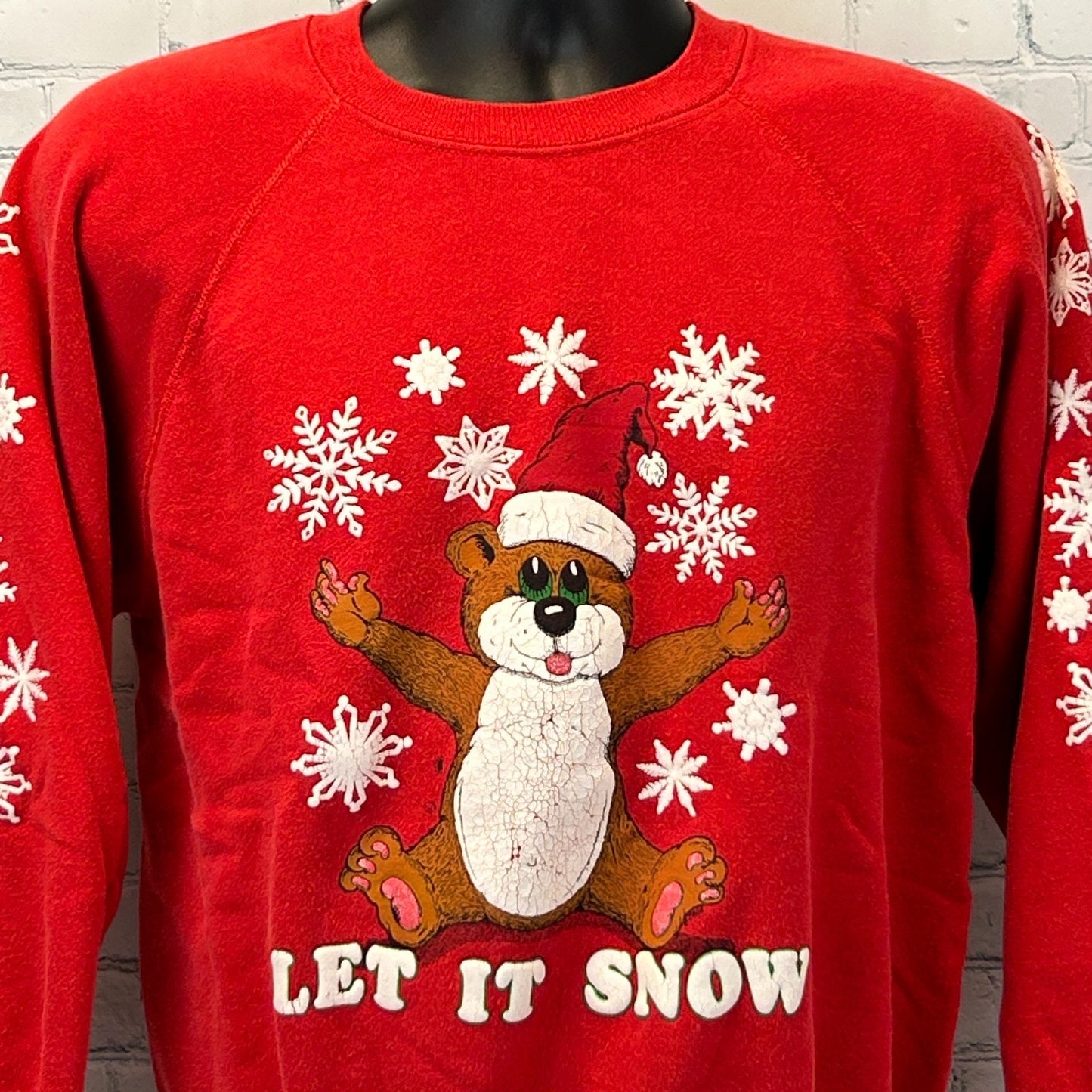 Red Hanes Christmas Sweater with 'Let It Snow' and festive bear design on the front