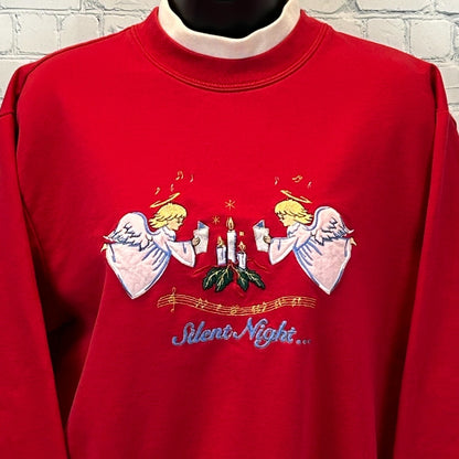 Red Bobbie Brooks Christmas Sweater featuring embroidered angels and 'Silent Night' details on the front