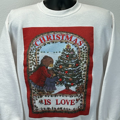 Jerzees Christmas Sweatshirt in white featuring a festive graphic of bears decorating a tree