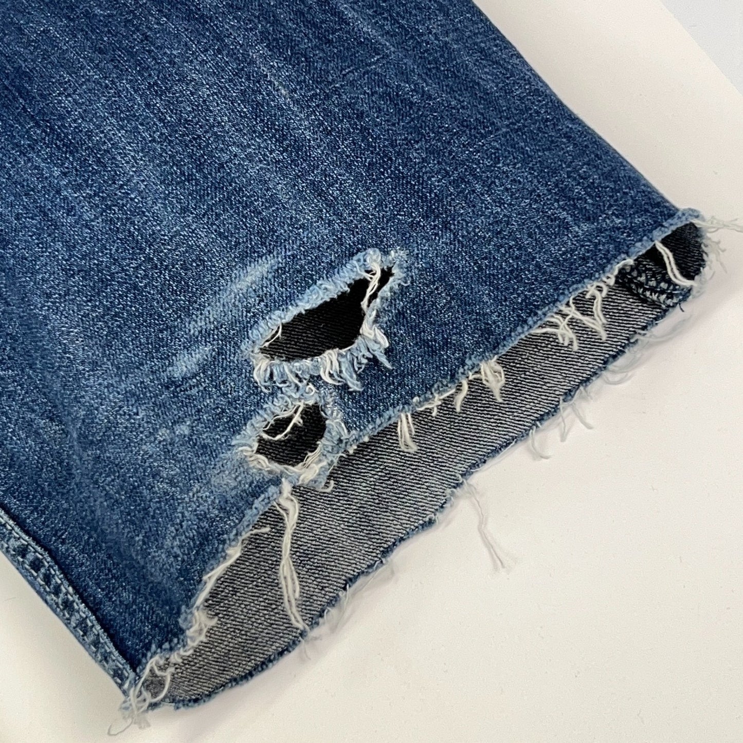 Akademiks Vintage Denim Jeans Blue Size 32 Front view with Distressed Hem