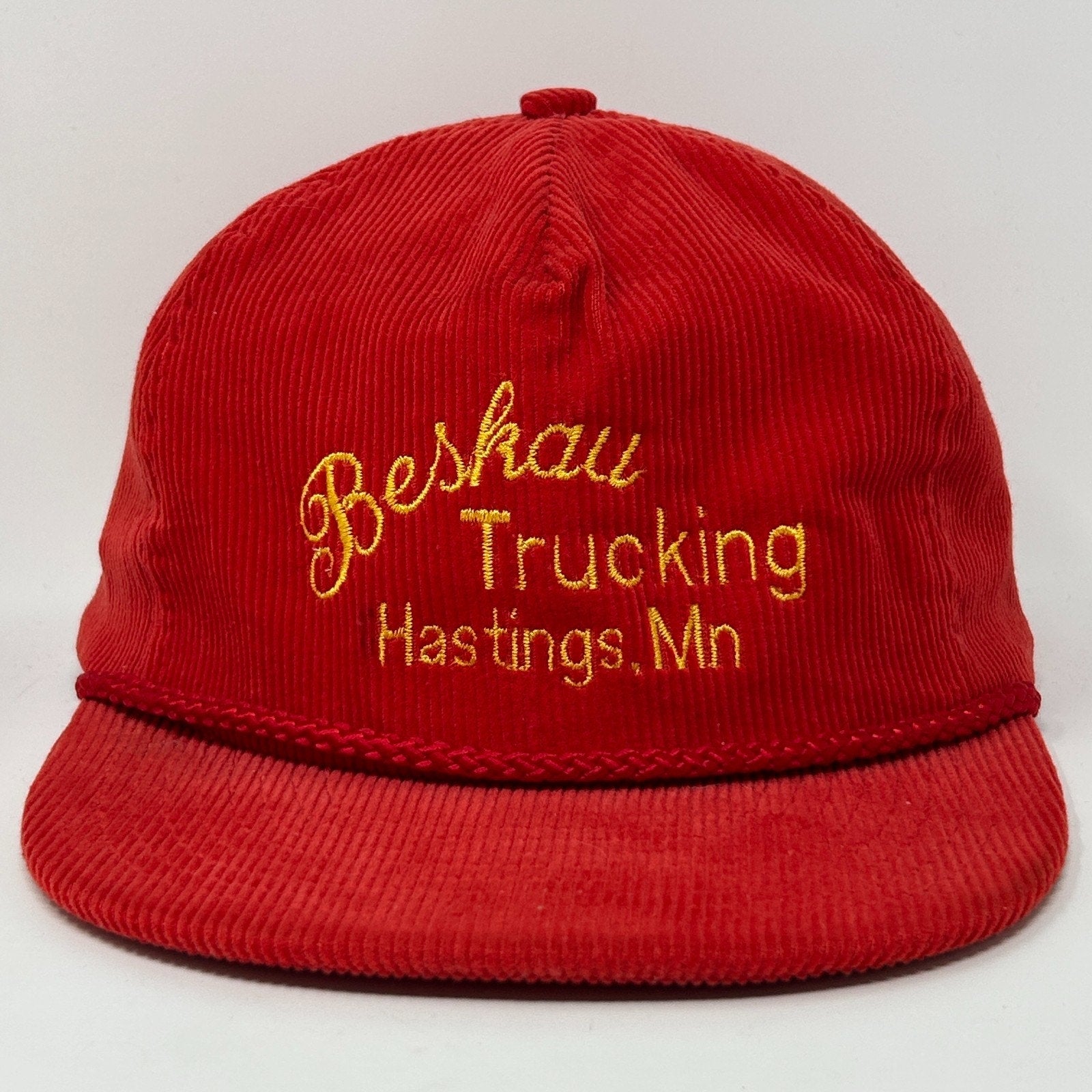 Vintage Hat in red with gold 'Bershau Trucking Hastings, Mn' embroidery on front