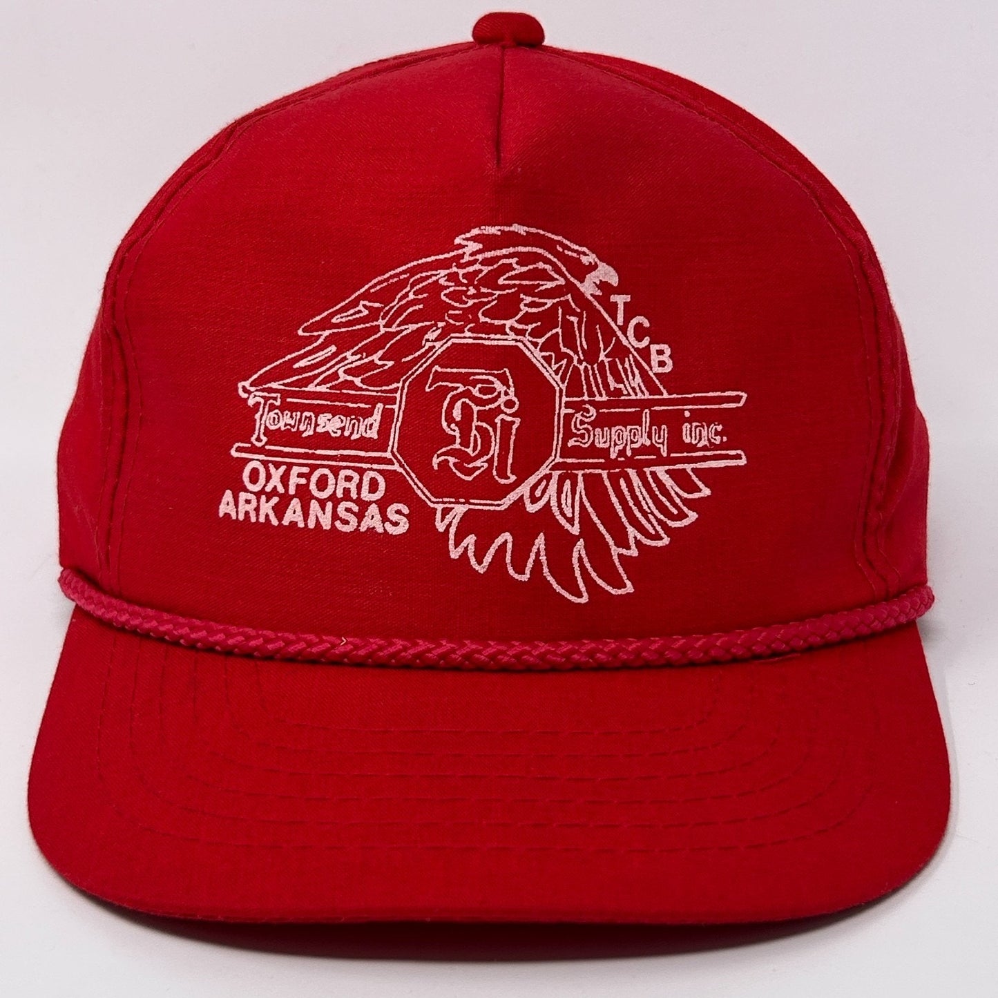 Red Vintage Hat with white embroidered logo and eagle design, featuring a detailed front view