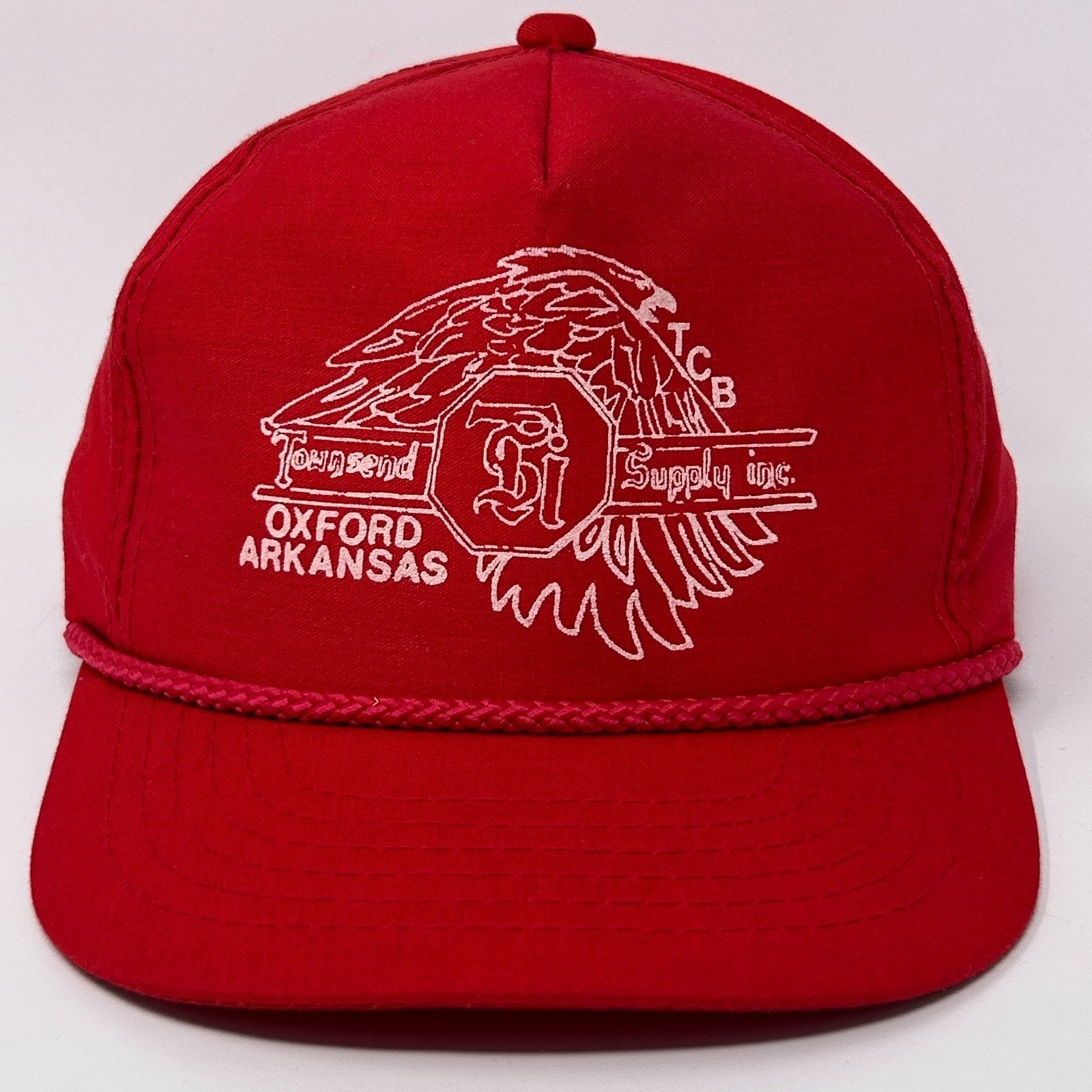 Red Vintage Hat with white embroidered logo and eagle design, featuring a detailed front view