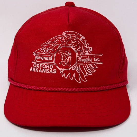 Red Vintage Hat with white embroidered logo and eagle design, featuring a detailed front view