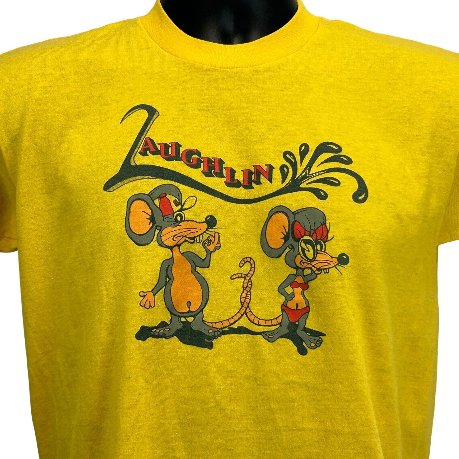Vintage yellow Laughlin T-shirt with cartoon mice design on the front, playful graphics for casual wear