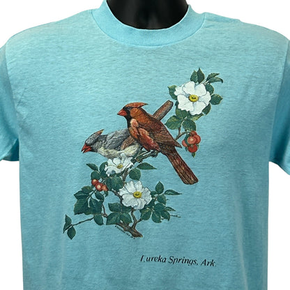 Light blue vintage T-shirt featuring Northern Cardinal design with flowers, size medium, front view