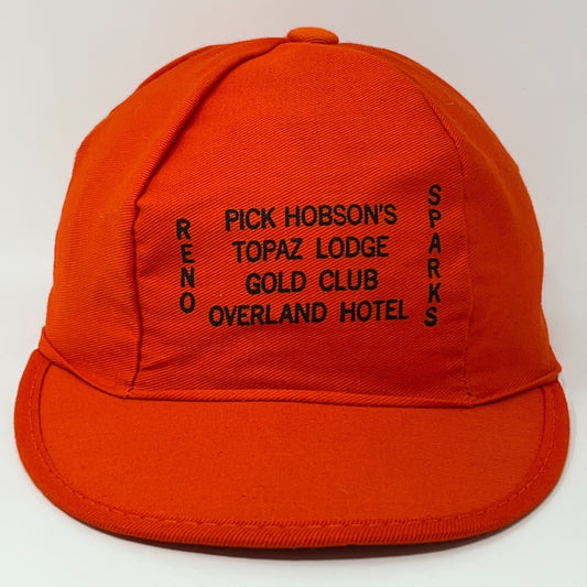 Front view of an orange vintage cap featuring logos from Reno Sparks Nevada attractions