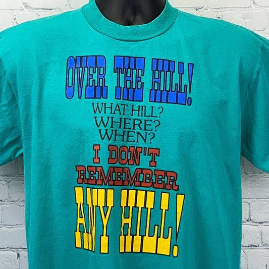 Jerzees Over the Hill Graphic T-Shirt in Teal, featuring colorful humorous text on the front