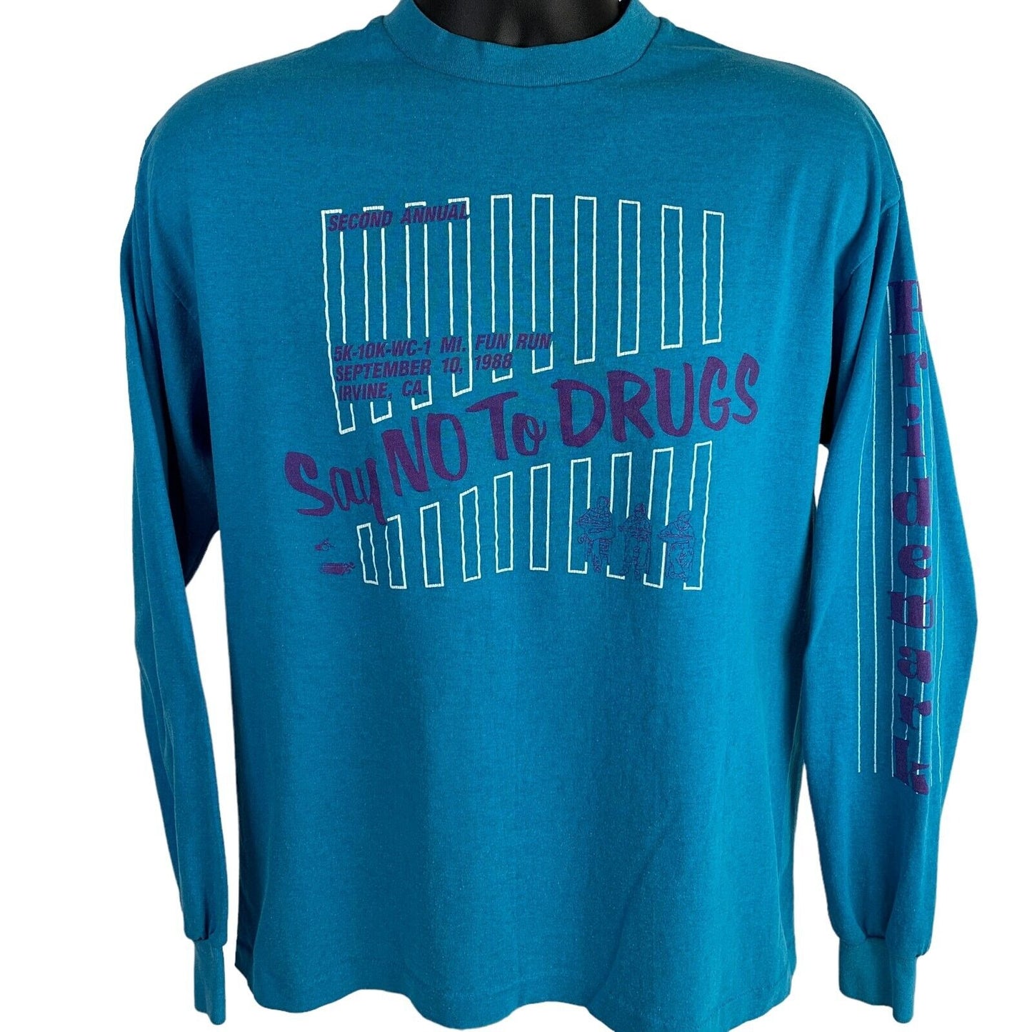 Vintage teal long-sleeve T-shirt with Say No To Drugs graphic on the front and sleeve detail