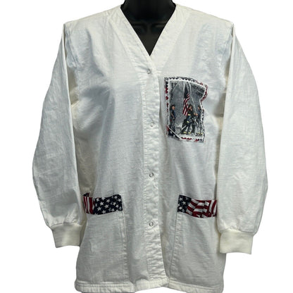 Vintage white scrub jacket featuring a front pocket with patriotic design and striped accents on pockets