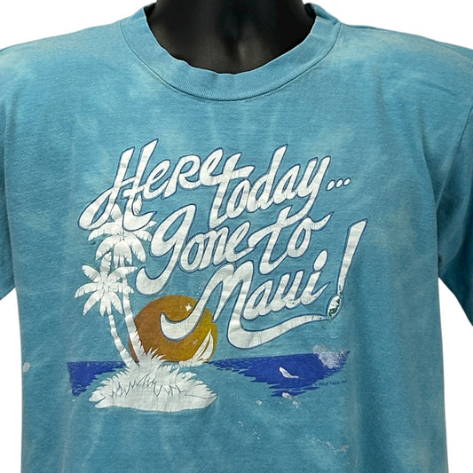 Vintage blue T-shirt featuring the phrase Here today gone to Maui with palm tree and wave graphic, front view