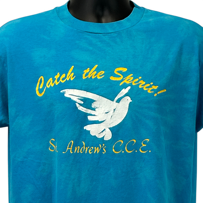 Turquoise Hanes T-Shirt featuring a front graphic with 'Catch the Spirit!' and 'St Andrews Church' text