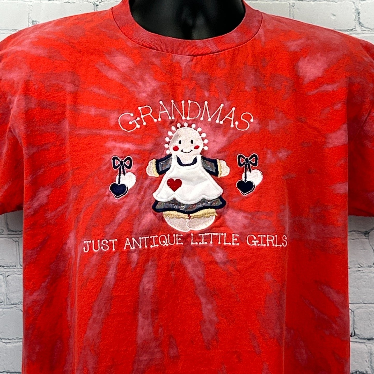 Vintage T Shirt in red with tie-dye pattern featuring a cute grandma graphic on the front