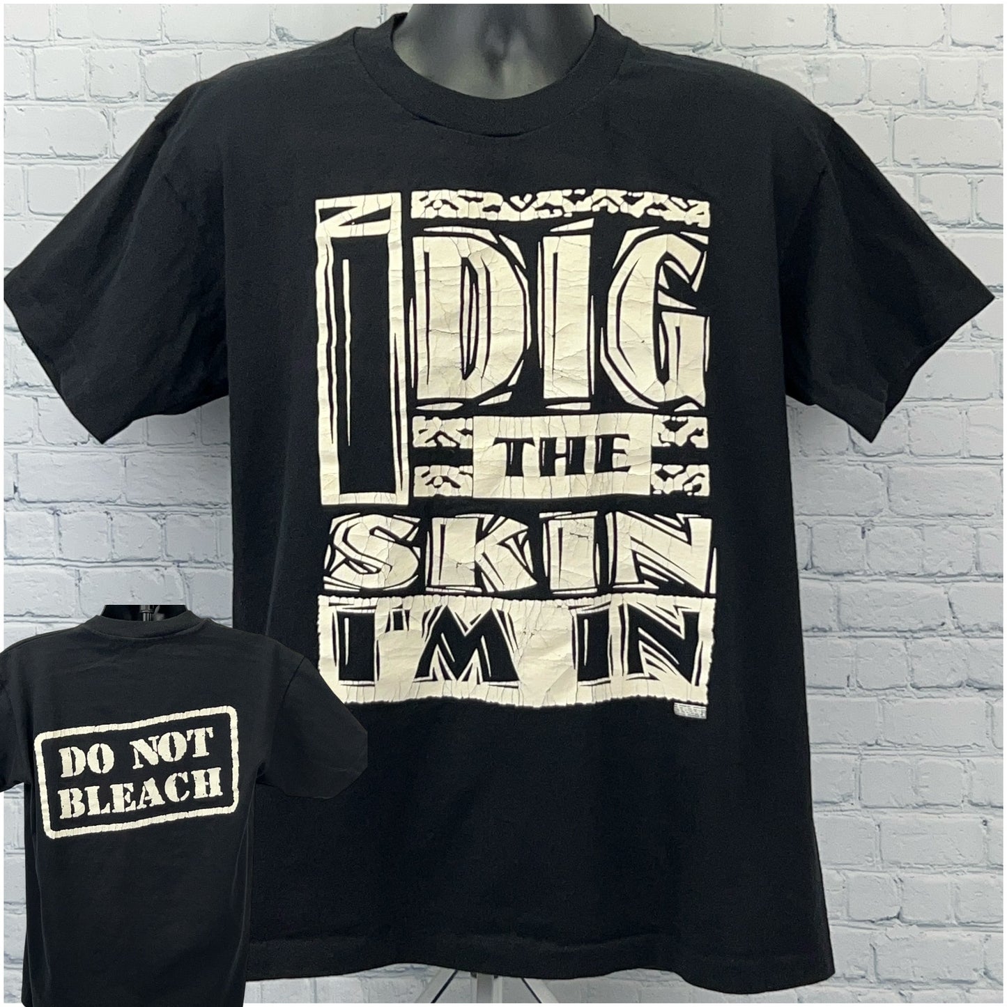 Anvil Vintage T Shirt in black with white graphic reading I DIG THE SKIN I'M IN, front view