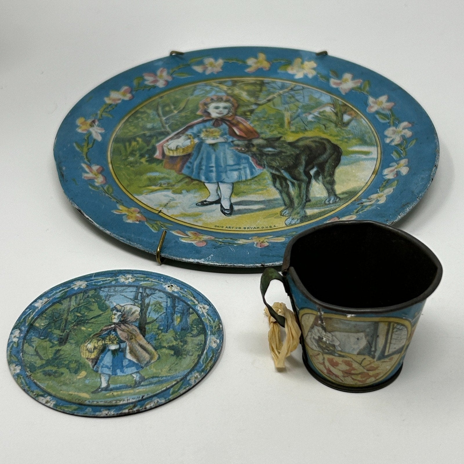 Ohio Art Vintage Tin Tea Set with Blue Floral Design, Includes Plate and Cup featuring Child and Dog Illustration