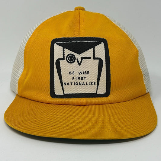 Vintage Trucker Hat in yellow with front logo reading Be Wise First Nationalize, featuring mesh back