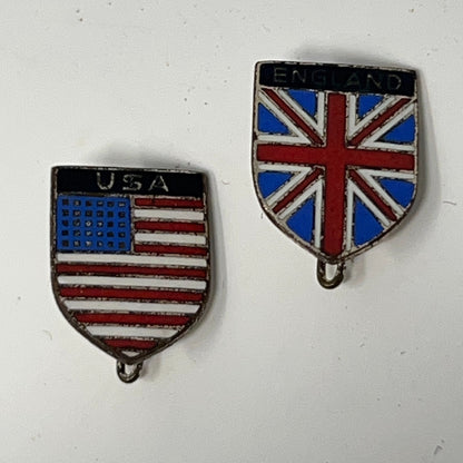 Vintage USA and England enamel pins with flags in red, white, and blue colors