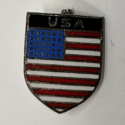 Vintage USA enamel flag pin in silver with red stripes and blue star field detail