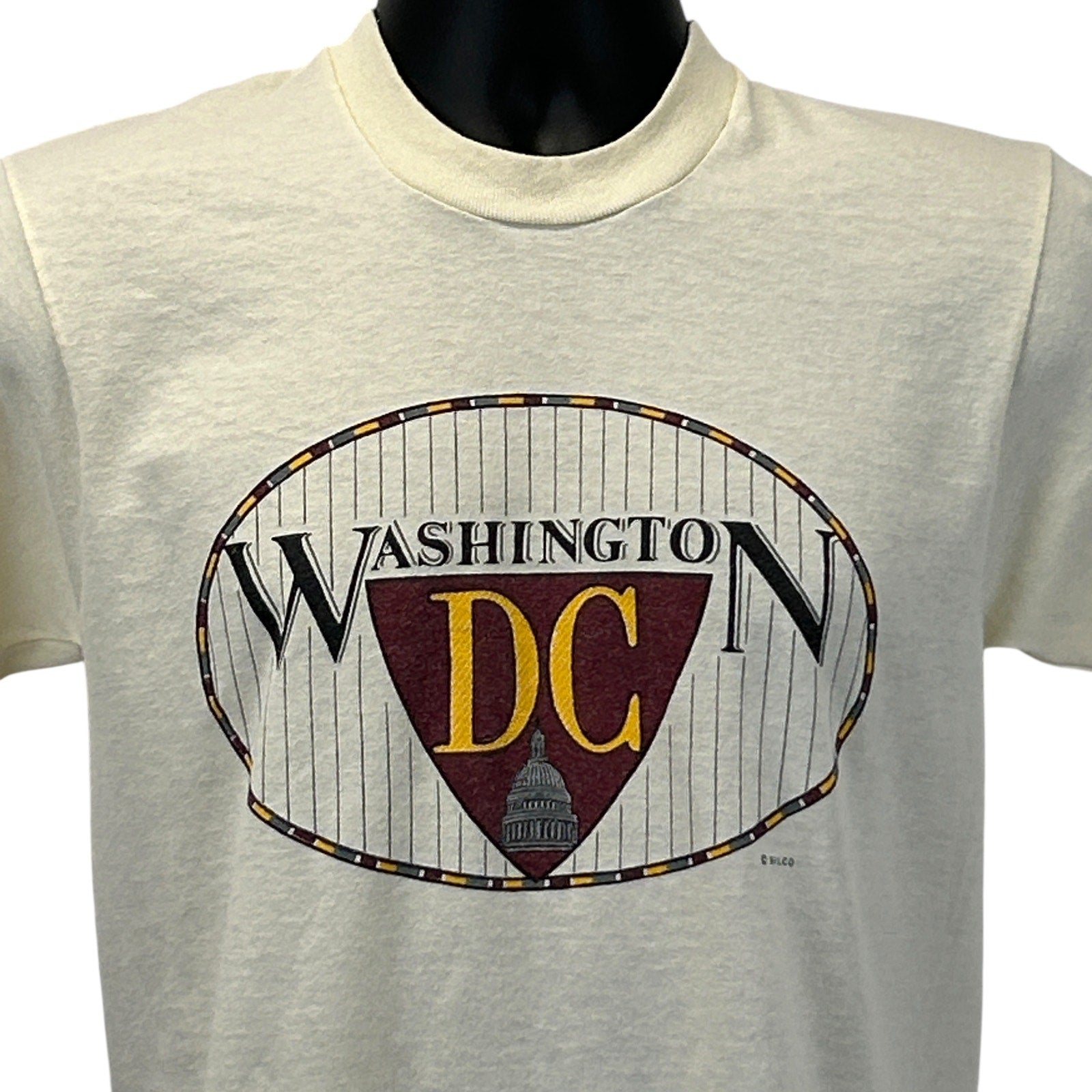 Cream Screen Stars T-Shirt featuring a Washington DC logo on the front in a classic design