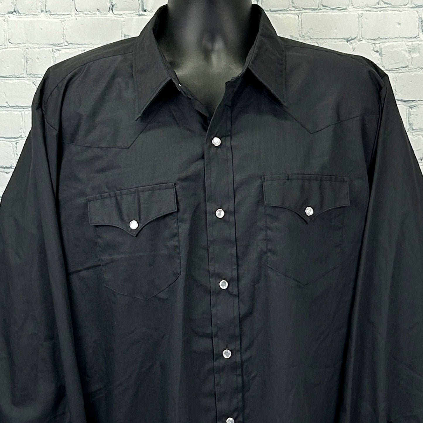 Black H Bar C Vintage Western Shirt, front view, featuring two chest pockets and snap buttons.