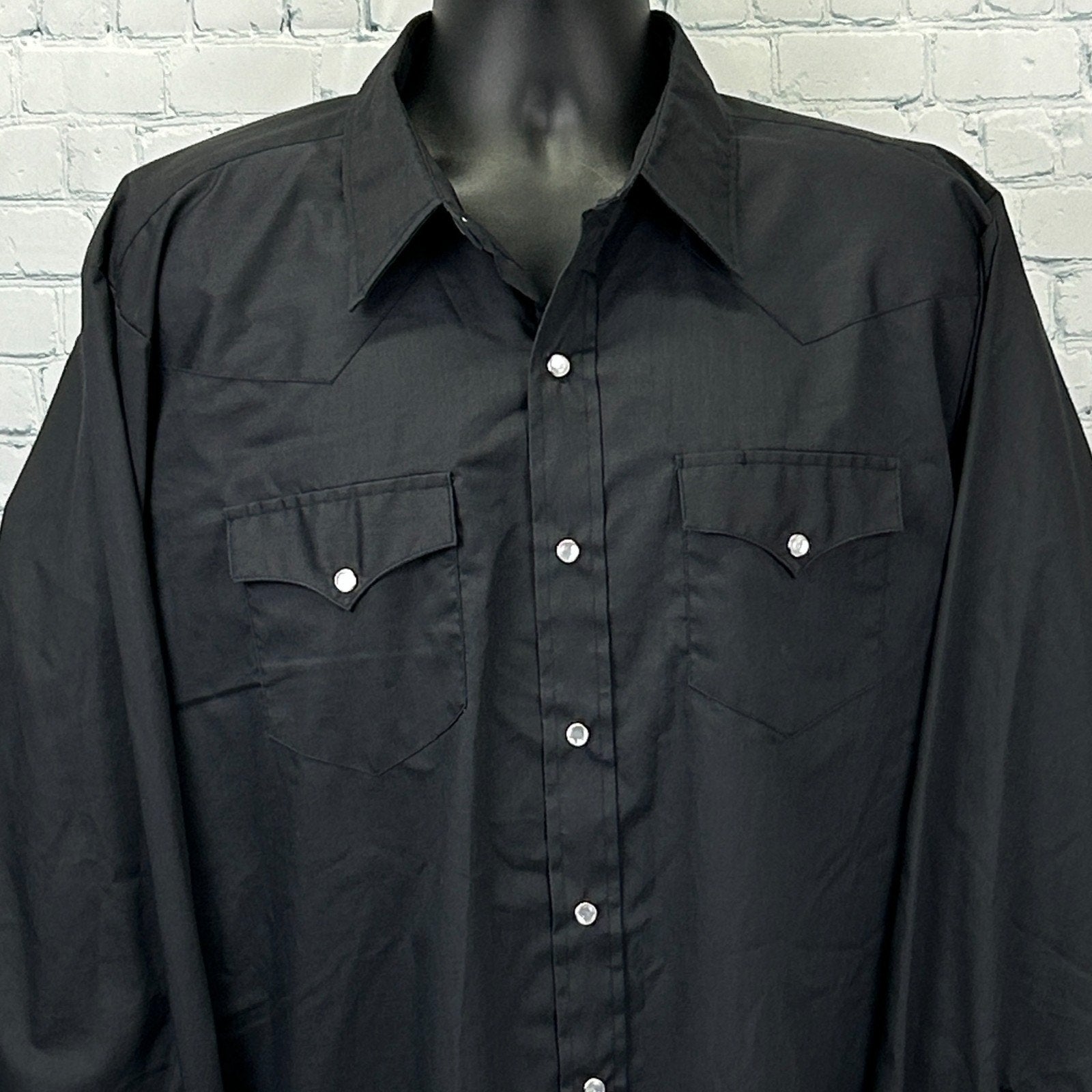 Black H Bar C Vintage Western Shirt, front view, featuring two chest pockets and snap buttons.