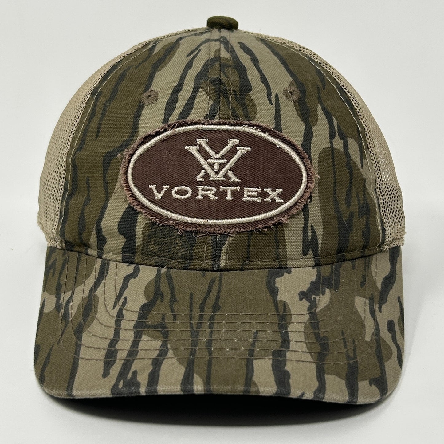 Tan and green camouflage Vortex Optics Hat featuring a logo patch on the front