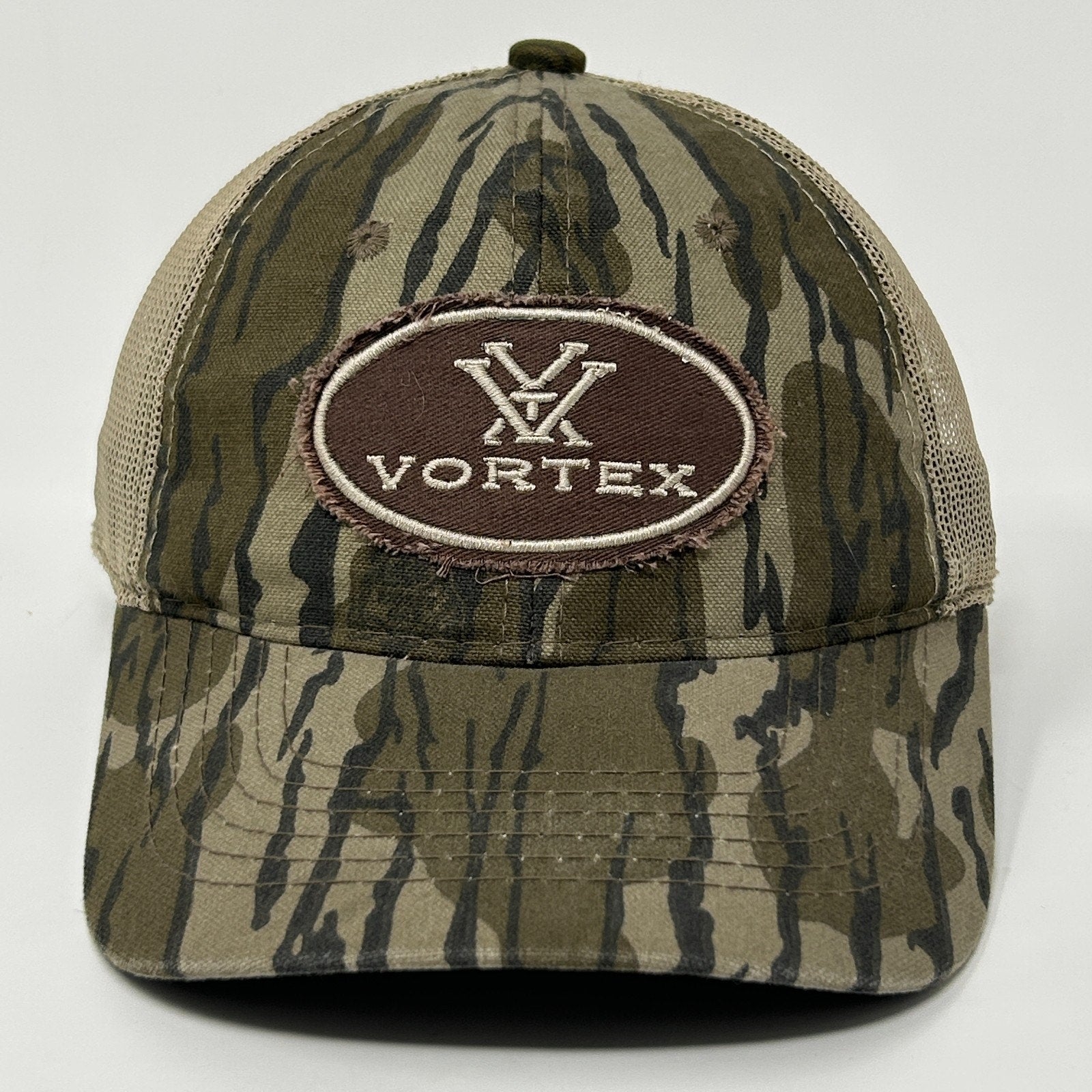 Tan and green camouflage Vortex Optics Hat featuring a logo patch on the front