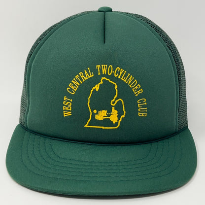 Front view of green cap featuring West Central Two Cylinder Club logo in yellow