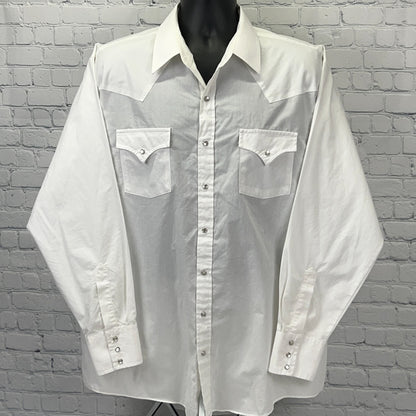White Western shirt with long sleeves, snap buttons, and front pockets for a classic look