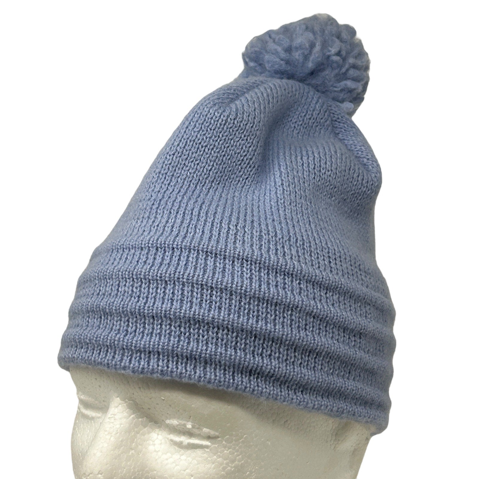 Wigwam light blue knit beanie hat with pom pom on top, front view, casual winter accessory