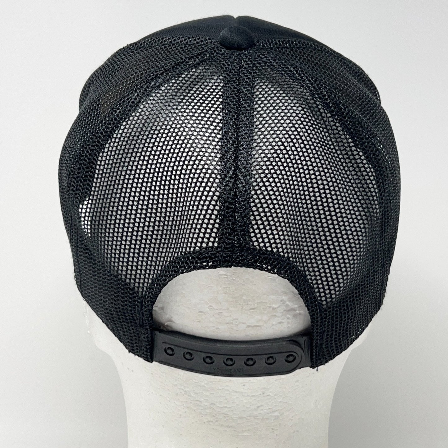 Vintage trucker cap hat in black, adjustable size, back view
