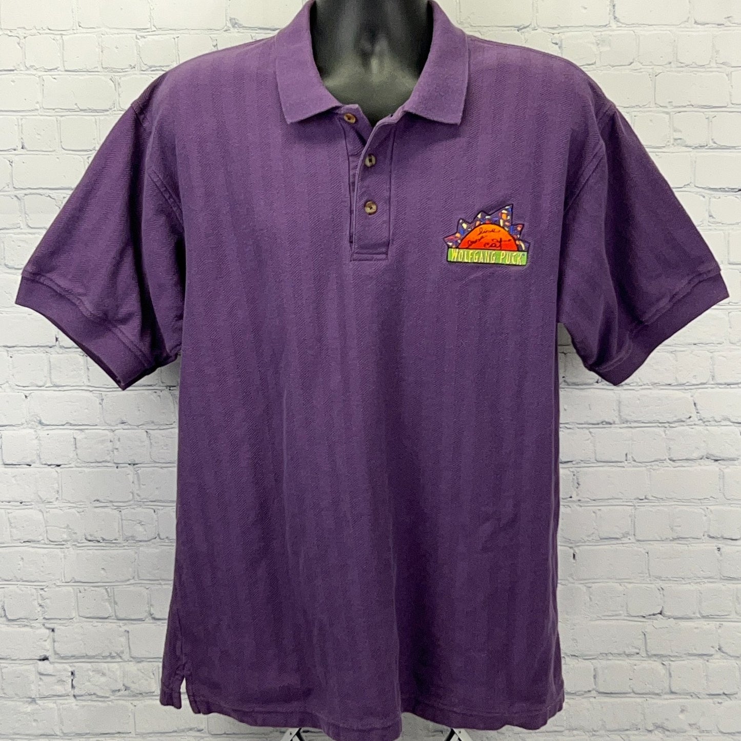 Purple vintage polo shirt featuring Wolfgang Puck logo on the front, size x-large, front view