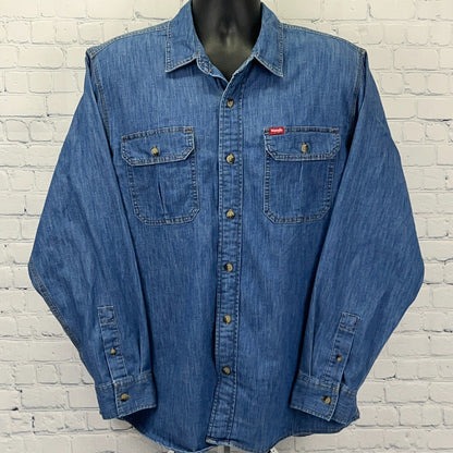 Wrangler blue denim shirt in large size, featuring button-up front and two chest pockets, displayed front view