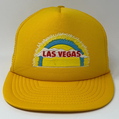 Vintage yellow trucker hat featuring a colorful Las Vegas embroidery in front view